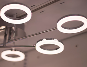 LED modern lights and bulbs on display in store lighting department.